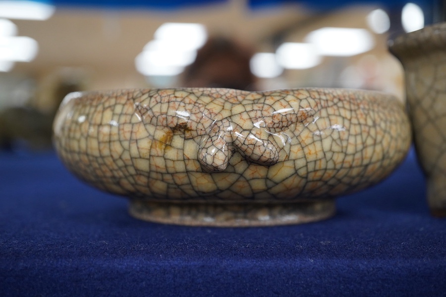 A Chinese crackle-glaze censer, 14cm wide, and a similar peach shaped brush washer, 12cm diameter (2). Condition - good.